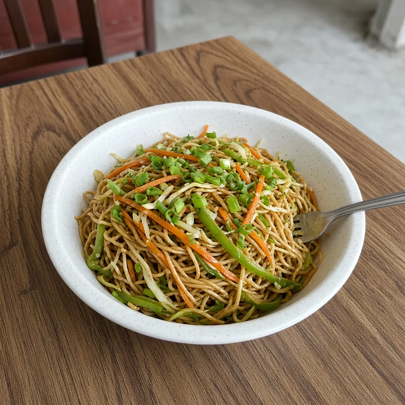 Veg noodles with carrot, cabbage, peppers and spring onion